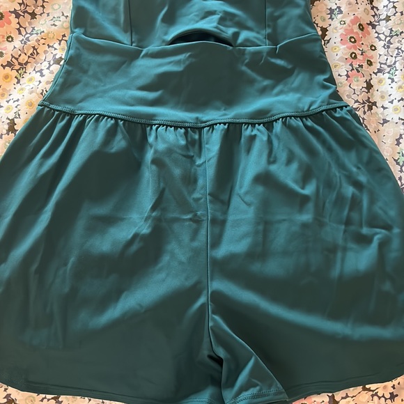 Green exercise/workout romper with cutout in the front. Pocket in the back! - Picture 3 of 6